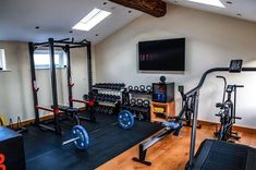 a home gym with weight machines and exercise equipment