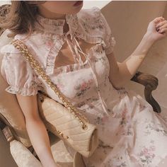 Petal Breeze is a Vintage-style Chiffon Fairy Dress in warm creamy pastel with a pretty vintage faded shabby chic rose floral print, creamy lining, and a feminine silhouette. *It's a favorite among our customers Size S bust 80-82cm waist 66-68cm length 86cm-89cm Size M waist 70-72cm bust 86cm length 89cm-90cm Size L waist 74-76cm bust 90cm length 90cm-91cm Size XL bust 96cm waist 80cm length 90cm-91cm Material: Polyester Angel Core Aesthetic Outfits, Victorian Inspired Fashion, Kawaii Swimsuit, Aesthetic Cottage, Cottage Fairy, Dress Aesthetic, Fairy Dress, Floral Short, Classy And Fabulous