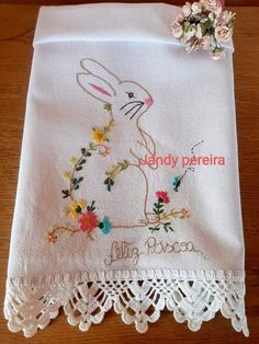 a white towel with a bunny on it