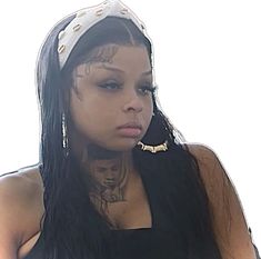 a close up of a person with long hair and piercings on her face, wearing a headband