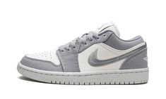 The Women’s Air Jordan 1 Low SE “Light Steel Grey” is a women’s-exclusive colorway of the low-top sneaker with an easy-to-style appearance.  The “Light Steel Grey” Jordan 1 Low SE is complete with a Sail-colored leather base contrasted with Light Steel Grey canvas overlays.  A grey Swoosh is embroidered on the sides of the shoe.  Other classic branding includes a white embroidered “Wings” logo on the heel and a grey Jumpman and grey “Air” logo on the tongue tag.  Release date: April 17, 2023 Air Logo, Grey Jordans, Classic Branding, Sneakers Box, Kobe Shoes, Jordan Ones, Nike Air Jordan 1 Low, Womens Air Jordans, Jordan 13 Retro