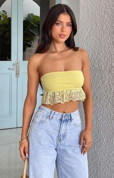 Yellow Strapless Crop Top

How to style:
The perfect going out top for hot summer () days. Pair it with a matching mini skirt () or go for a casual style with your favourite jeans (). 

Features:


  
 * Light weight material 
 * Strapless 
 * Cropped length 
 * Lots of stretch 
 * Pull on design 
 * Partially lined with mesh outer (top half lined, sheer laced detailing bottom half) Greece Trip, Prom Midi Dress, 60's Dress, Summer Playsuit, Strapless Crop Top, Beginning Boutique, Yellow Lace, Strapless Tops, Going Out Tops