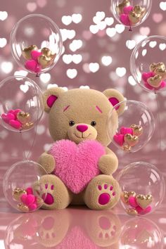 a teddy bear holding a pink heart surrounded by bubbles