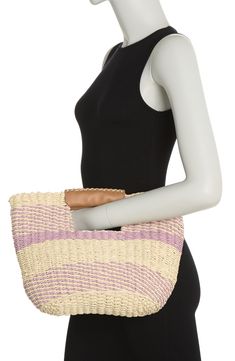 Pops of color bring a touch of whimsy and playful charm to this leather trimmed woven tote. 15" x 10.5" x 2" Top carry handles Open top Straw and leather Imported Shopping Beach Bag With Braided Top Handles, Top Handle Beach Bag With Braided Handles For Shopping, Shopping Beach Bag With Top Handle And Braided Handles, Woven Top Handle Beach Bag, Woven Top Handle Beach Bag For Shopping, Casual Woven Top Handle Beach Bag, Spring Beige Bags With Rolled Handles, Chic Spring Beach Bag With Top Handle, Chic Top Handle Beach Bag For Spring