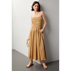 Brown (55% Linen, 45% Rayon). Casual dress. Sleeveless. Square neck. Side zipper closure. 38" from shoulder to hemline. Imported. Lined Sleeveless Midi Sundress, Lined Sleeveless Sundress Midi Length, Chic Pleated Midi Sundress, Chic Pleated Midi Length Sundress, Pleated Sleeveless Sundress At Midi Length, Sleeveless Beige Sundress For Date Night, Beige Sleeveless Sundress For Date Night, Summer Sleeveless Knee-length Dress With Ruched Bodice, Knee-length Sleeveless Dress With Ruched Bodice For Summer