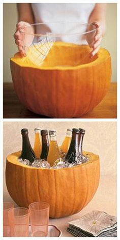 there is a pumpkin shaped bowl with bottles in it