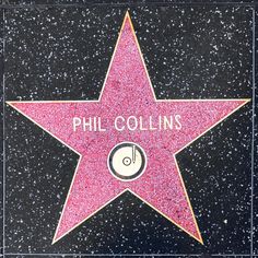 the star on the hollywood walk of fame for phil collins is shown in pink glitter