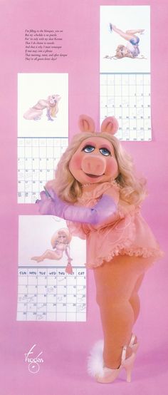 the miss piggy doll is standing in front of a calendar