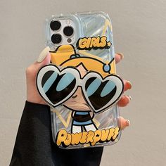 PRICES MAY VARY. 📱【Compatibility】ONLY Designed for iPhone 15 Pro Max Case with a 6.7-inch screen and 3 camera lenses. 🎺Note: The Sunglasses Shape grip holder, which can be used as a stand after being pulled out. ⭕【Cute Cartoon Pattern】Fashion & Stylish, this super cute cartoon case with unique Powerpuff girls pattern designs, which makes your phone novel, eye-catching & personality. Never fade, anti-yellowing. Pretty cool as a gift for Girls, Boys, Women, Kids & Teenagers. ❤️【Sunglasses Shape Girls Phone Cover, New Powerpuff Girl, Sunglasses Stand, Funny Phone Cases, Soft Power, Kid N Teenagers, Flower Wallpapers, Cute Sunglasses, Cute Flower Wallpapers