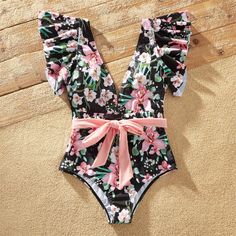 Introducing our Family Matching Floral Swim Trunks and Ruffle-Sleeve Swimsuit! Gear up for unforgettable summer moments with our Family Matching Allover Floral Print Swim Trunks Shorts and Ruffle-Sleeve Belted One-Piece Swimsuit. Whether you're hitting the beach or lounging by the pool, this matching set is a must-have for the whole family. Fabric: Crafted from a blend of polyester and spandex, our swim trunks and swimsuit are designed for comfort and durability, allowing you to enjoy endless ho Family Bathing Suits, Pinafore Skirt, Floral Swimwear, Sleeve Swimsuit, Jumpsuit And Blazer, Black Boy, Printed Swim, Matching Family Outfits, Distressed Denim Shorts