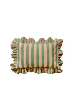 a green and white striped pillow with ruffled edges