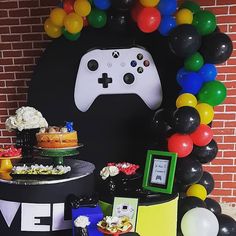 a video game themed birthday party with balloons