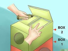 a hand opening a box with two hands