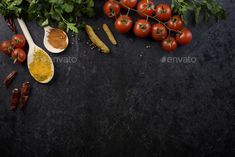 tomatoes, parsley and other vegetables on a black background - stock photo - images