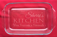 a clear glass plate with the words sherri's kitchen on it and a red background