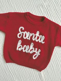 An oversized, hand embroidered sweater  in sizes 0-3MONTHS - 5T. All embroidery is done by hand and will vary slightly for each item.  The size of embroidery + letters will also vary depending on the size of the sweater. The yarn shown in the listing photo will be used unless you specify otherwise!  If you have any questions, please feel free to message me :) ------------------------------------------------------------------------------------------------------------------------------------------ Embroidered Sweater Diy, Toddler Christmas Sweater, Embroidered Christmas Sweater, Personalised Jumpers, Baby Christmas Gift, Snowman Sweater, Pull Bebe, Kids Christmas Outfits, Pull Oversize