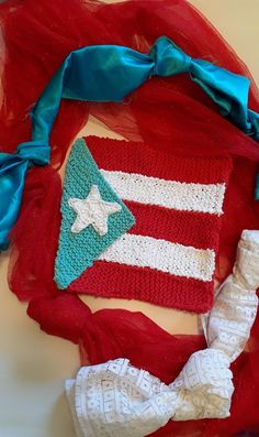 "Each time I make a Puerto Rican flag, I always try to make it better and better. This one is knit, the five pointed star is always crochet.  I do make crochet flags, but this one is knit. Backing can be in solid colors or multicolored. Can be framed or hung, I am adding two loops on the back for hanging. Made of 100% cotton, cotton blends, and acrylic yarns. This does make a great flag for someone who honors their cultural roots, and can be prominently displayed in any room. It also makes a gre Small Flags, Crochet Cord, Office Setting, Red Yarn, Five Pointed Star