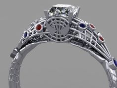 an intricately designed ring with red, white and blue stones on the band is shown