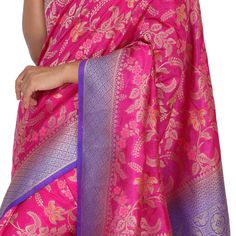 Introducing the Banaras Tilfi Sari with Pattu Border - a resplendent sari that is perfect for making a regal statement. Ideal for special occasions, this sari features a beautiful pink hue and is adorned with a traditional pattu border in purple. The intricate fall and pico work add to the overall allure of the sari, while the stitched blouse completes the look. Whether you're attending a wedding or a festive occasion, make sure to turn heads by draping yourself in this stunning sari. Fall and P Festivals Brocade Pre-draped Saree With Pallu, Banarasi Silk Pre-draped Saree For Celebration, Festive Brocade Pre-draped Saree With Zari Work, Festive Celebration Katan Silk Pre-draped Saree, Tussar Silk Pre-draped Saree For Diwali Celebration, Transitional Traditional Wear With Zari Work, Festive Celebration Pre-draped Saree With Zari Weaving, Semi-stitched Traditional Wear For Celebration, Festive Bollywood Handloom Pre-draped Saree