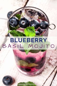 blueberry basil mojito in a glass with mint garnish on top