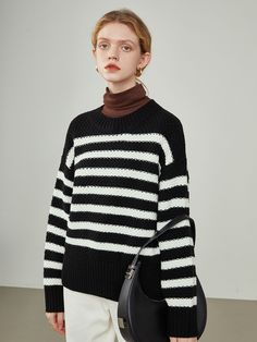 Editor's NotesThis product is a knit sweater made of acrylic and wool mixed fabric and features a loose fit and marine stripe pattern. - Knit sweater- Acrylic and wool mixed fabric- Loose fit- Marine stripe patternMeasurements(in.)Size: One Size(XS-M)- Chest: 43.7in.- Shoulder: 20.47in.- Hem: 19.68in.- Total Length: 22.83in. *Model info: Height 5' 57, Top/Bottom -S size Composition & Care- Fabric: 86% Acrylic, 14% Wool- Light Hand Washing or Dry Cleaning Designer- by We'Dee Marine Stripe, Mixing Fabrics, Sweater Making, Striped Knit, Stripe Sweater, Hand Washing, Stripes Pattern, Black Sweaters, Knit Sweater