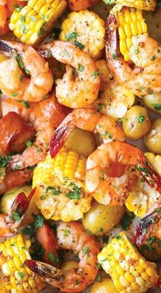 shrimp and corn on the cob with parsley