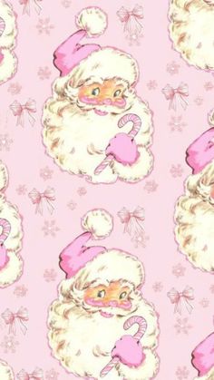 a pink and white santa claus pattern with hearts on it's chest, wearing a pink hat and holding a candy cane