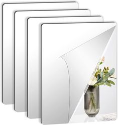 four white coasters with flowers in a vase on the front and back side, all facing different directions