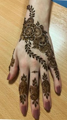 hendi design on the palm of someone's hand