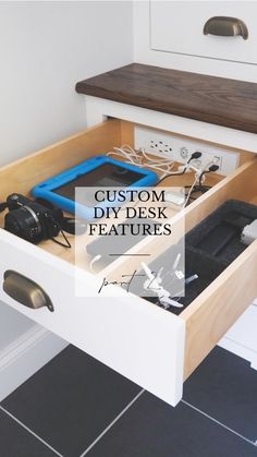 an open drawer in a bathroom with the words custom diy desk features on it