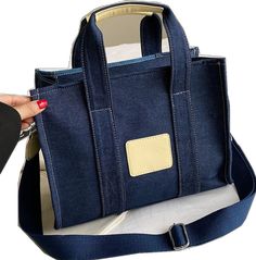 Trendy Everyday Denim Satchel, Trendy Denim Satchel For Everyday, Blue Denim Shoulder Bag For Daily Use, Trendy Blue Canvas Bag With Pockets, Casual Denim Rectangular Satchel, Daily Denim Blue Denim Bag, Daily Use Denim Blue Denim Bags, Daily Use Denim Blue Bags, Trendy Blue Canvas Satchel