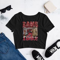 Show your Ram Pride with the WSSU Inspired Crop Top! * 52% combed ring-spun cotton, 48% polyester * Fabric weight: 3.6 oz/yd² (122 g/m²) * 40 singles * Slim fit * Side-seamed construction * Blank product sourced from Nicaragua, the US, or Honduras This product is made especially for you as soon as you place an order, which is why it takes us a bit longer to deliver it to you. Making products on demand instead of in bulk helps reduce overproduction, so thank you for making thoughtful purchasing decisions! 90s Style Tops For Fan Merchandise In Fall, Casual Fitted Top For Fan Merchandise, 90s Inspired Graphic Print Fall Tops, 90s Inspired Graphic Print Tops For Fall, Vintage Fitted Tops For Streetwear, Winston Salem State University, Winston Salem, Especially For You, 90s Style