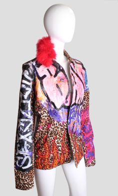 OR 4 interest-free installments of $87.50 USD by Leopard Graffiti Jacket Jacket hand painted by ZOOM Cherry. Graffiti on back reads, "FANCY". FUR embellished collar. Size Women Medium One of a kind. Button closure. Front pockets. Fitted Graffiti Print Outerwear For Fall, Trendy Hand Painted Outerwear For Fall, Hand Painted Multicolor Outerwear For Fall, Multicolor Hand Painted Outerwear For Fall, Trendy Hand Painted Fall Outerwear, Trendy Hand-painted Fitted Outerwear, Graffiti Jacket, Spring Denim Graffiti Print Outerwear, Trendy Graffiti Print Denim Jacket