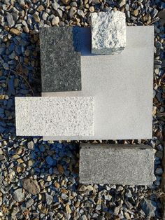 some rocks and gravel on top of each other in the shape of an abstract design