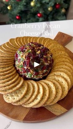 1.4M views · 65K reactions | This might be my most popular holiday recipe😍 Recipe👇

Ingredients
8 oz cream cheese, softened
1 cup white sharp cheddar, shredded
1/2 cup dried cranberries, chopped
2 tbsp fresh chives, chopped
1/2 tsp garlic powder
1/2 cup honey roasted pecans, chopped
1/2 cup whole dried cranberries
2 tbsp fresh chives, chopped
1 package crackers for serving

Instructions
1. Remove cream cheese from the fridge and set it on the counter to soften. Chop ½ cup dried cranberries, ½ cup pecans (if not already chopped), and ¼ cup chives. Shred 1 cup white sharp cheddar cheese.

2. In a large bowl or stand mixer, beat 8 oz cream cheese, 1 cup white sharp cheddar, ½ cup chopped dried cranberries, 2 tbsp chopped chives, and ½ tsp garlic powder until combined. Scraping down the side Honey Roasted Pecans, Cranberry Cheese, Roasted Pecans, Appetizers Easy Finger Food, Cheese Ball Recipes, Holiday Snacks, Party Food And Drinks, Honey Roasted, Xmas Food