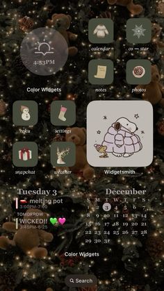 the christmas tree is decorated with teddy bears and other holiday related items, including an iphone app