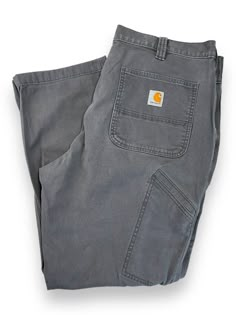 *PLEASE READ ENITRE DESCRIPTION AND REFER TO MEASUREMENTS BEFORE PURCHASING* Carhartt Relaxed Fit Rugged Flex Canvas Workwear Five Pocket Pants Size 38 MEASUREMENTS Size is based off our measurements, not the tagged size. Please refer to measurements. SIZE - 38 WAIST FLAT - 19" (measurement is multiplied by 2 to get the size) RISE - 12" INSEAM - 29" LEG OPENING - 9" Please note that due to the nature of pre-owned clothing; the size mentioned in the title may not be an accurate representation of Reselling Clothes, Leather Jacket Men Style, Carhartt Cargo, Mens Work Pants, Pants Baggy, Carhartt Pants, Wardrobe Accessories, Wardrobe Style, Pocket Pants