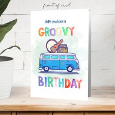 a greeting card featuring an image of a van with luggage on it and the words, happy you have a groovy birthday