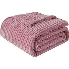 a pink blanket is folded on top of a white background and it's been rolled up