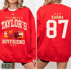 Go Taylor's Boyfriend Sweatshirt, Karma 87 Sweatshirt, KC Fan Sweater, Red Black or Gray Sweater, Taylor Fan Shirt, Football Party Sweater. Perfect for any Taylor Fan who is going to watch the big game on February 11th! Show your love of the hottest new couple that is the talk of the country! Ideal for any situation, a unisex heavy blend crewneck sweatshirt is pure comfort. These garments are made from polyester and cotton. This combination helps designs come out looking fresh and beautiful. The collar is ribbed knit, so it retains its shape even after washing. There are no itchy side seams on these sweaters.  .: 50% cotton, 50% polyester .: Medium-heavy fabric (8.0 oz/yd² (271.25 g/m .: Loose fit .: Sewn-in label .: Runs true to size Red Fan Apparel T-shirt For Fall, Red T-shirt For School Spirit In Fall, Red T-shirt For Fall Fan Merchandise, Red Long Sleeve Team Spirit Sweatshirt, Red School Spirit Tops For Fall, Red Tops For Fall School Spirit, Red Tops With School Spirit For Fall, Red Team Spirit Tops For Fall, Red Fan Apparel Sweatshirt For Sports Season