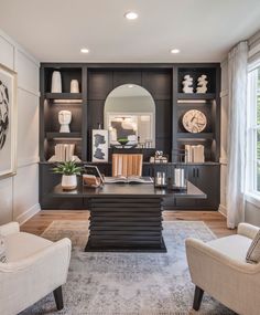 a living room filled with furniture and bookshelves