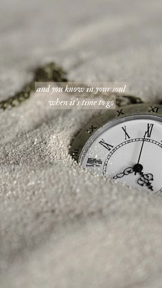 an alarm clock in the sand with a quote above it that reads, and then there is no time left