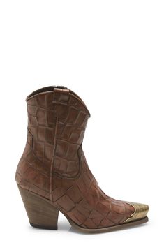 Etched metallic hardware gleams at the toe of a quintessential Western boot that adds a rustic element to your look. 2 3/4" heel (size 38.5) 7" shaft Side zip closure Leather upper, lining and sole Made in Italy Women's Shoes Western Boots Women, Western Boot, Bitter, Western Boots, Wedge Boot, Side Zip, Women's Shoes, Leather Upper, High Heels