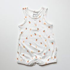 The ideal summer romper in a cheerful citrus print! Made of bamboo and organic cotton, this romper is breathable and soft. It has adorable snap details and gathered shorts. You're sure to get lots of compliments on this perfect summer outfit for your little one! Neutral Baby Clothes, Perfect Summer Outfit, Perfect Summer, Summer Outfit, Little One, Baby Clothes, Summer Outfits, Organic Cotton, Dress Up