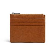 Introducing our RFID Wallet Card Holder, meticulously crafted from full grain Italian vegetable tanned leather. This premium material ensures durability and a luxurious feel, perfect for everyday use. Key Features: Material: Full grain Italian vegetable tanned leather, known for its quality and natural appearance. Size: Compact dimensions of 8.5 x 11 cm, ideal for easy carrying. Color: Cuoio, a rich and classic shade that ages beautifully over time.Structure:4 credit card slots for organized storage.1 top zipper pocket for secure storage of coins or other essentials.RFID blocking function to protect your credit cards and personal information from unauthorized scanning. Enhance your security and style with this RFID wallet card holder, designed for those who prioritize both functionality an Brown Textured Leather Wallet For Business, Brown Textured Leather Business Wallet, Brown Textured Leather Wallet, Leather Coin Purse With Interior Card Slots For Business, Textured Leather Card Holder For Everyday Use, Classic Textured Leather Card Holder For Everyday, Modern Leather Coin Purse For Business, Brown Textured Leather Wallet For Everyday Use, Brown Textured Leather Wallet For Daily Use