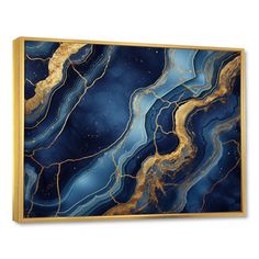 an abstract painting with gold and blue marbles on it's canvas wall art