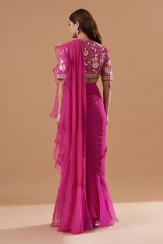 Pink ruffle pre-draped saree in organza and georgette base. Comes with a floral and thread embroidered blouse. - Aza Fashions Silk Blouse Piece With Ruffles For Reception, Silk Ruffled Blouse Piece For Reception, Silk Saree With Ruffles For Wedding, Silk Ruffle Saree For Wedding, Silk Ruffled Saree For Wedding, Wedding Silk Saree With Ruffles, Bollywood Style Silk Blouse Piece With Ruffles, Silk Blouse Piece With Ruffles For Wedding, Silk Pre-draped Saree With Ruffles For Wedding