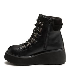 Blaze a trail with our Women's Handle Platform Hiker Boot. The black faux leather gives an urban twist to the classic hiker boot style. The side zipper and 2.56" heel offer a modern, fashion-forward look. Pair with distressed denim and an oversized flannel for an outfit that screams, "I'm ready for any adventure!" 🏔️ Style: Platform hiker boot Upper: Faux leather in black Lining: Microfiber Midsole: Plush Foam Comfort Insole Sole: Rubber sole Heel height: 2.56 inches Shaft height: 4.92 inches L