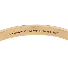 This is an authentic CARTIER 18K Yellow Gold LOVE Cuff Bracelet size 17. The bracelet is crafted of 18 karat yellow gold and features the engraved LOVE screw symbol motif throughout the open cuff. Bracelet Sizes, Cartier, Cuff Bracelet, Screw, Yellow Gold, Cuff, Bracelet, Yellow, Gold