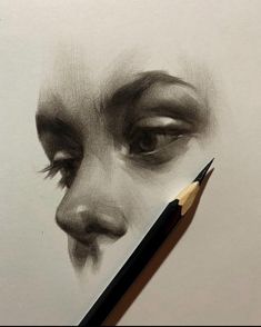 a pencil drawing of a woman's face with her eyes closed and eyebrows drawn